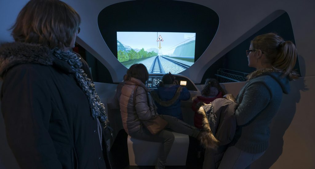 Family in a simulator at the Train World museum in Brussels